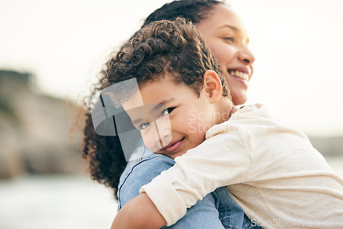 Image of Hug, portrait and a mother and child at the beach for summer, holiday or happiness together. Smile, care and mom with a kid at the ocean for a vacation, bonding or travel in Costa Rica for love