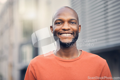 Image of .Black man, smile and portrait outdoor on a city street with a positive mindset, confidence and freedom. Face of a happy african person or student on an urban road with casual style for travel.