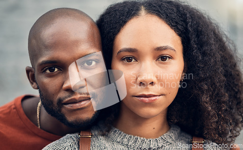 Image of .Face, couple and love outdoor, serious and bonding together for support in urban city. Portrait, interracial and African man and woman with profile picture for care, commitment and trust on date.