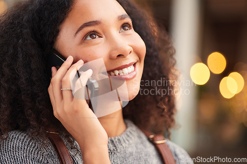 Image of Phone call, happy and young woman in the city waiting for a cab, lift or public transport. Smile, confident and beautiful female person from Mexico on mobile conversation with cellphone in urban town