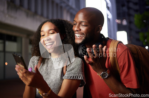 Image of .Phone, meme and funny with a couple in the city at night for love, freedom or fun together. Face, social media or mobile with a black man and woman in an urban town to enjoy nightlife while bonding.