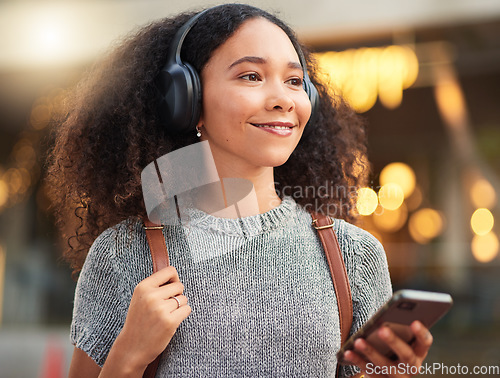 Image of .City, headphones and woman with cellphone, smile and connection with happiness, mobile app and streaming music. Outdoor, female person and happy girl with a smartphone, sound and headset with audio.