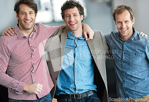 Image of Team, portrait or happy business developers hug after meeting together in office with smile or support. Confident, or group of proud designers in collaboration for success or workplace solidarity