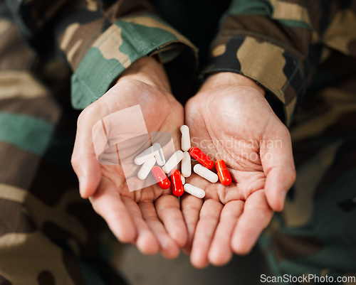 Image of Soldier, hands and drugs from psychologist in therapy or person healing mental health with medication, medicine or pills. Stress, anxiety and veteran in therapy with trauma, problem or depression