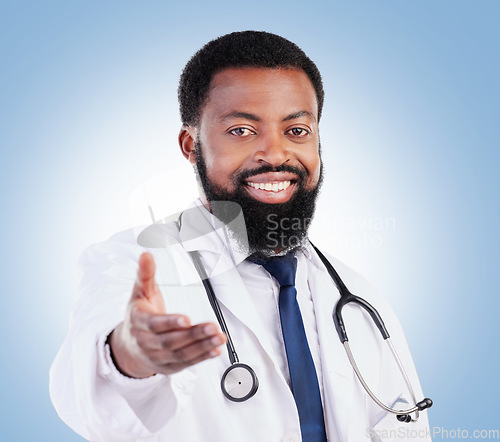 Image of Portrait, doctor and black man in studio with hand, offer or deal, promo or announcement on blue background. Face, smile and African male healthcare expert with advice, questions or coming soon news