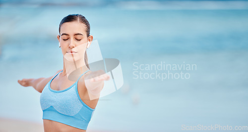 Image of Fitness, music and woman by beach for yoga with mockup space for wellness, healthy body and energy. Sports, nature and female person listen to audio or song for exercise, training and workout by sea