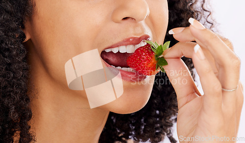 Image of Healthy, eating or mouth of woman with strawberry in studio on white background for clean diet nutrition. Hand, bite closeup or girl model with beauty or natural fruits for nutrition or wellness