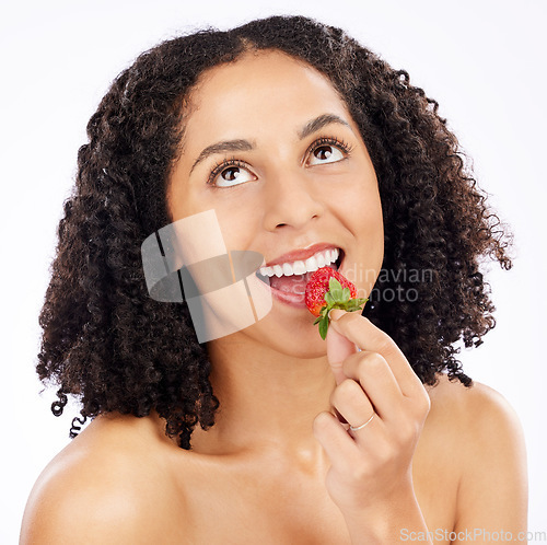 Image of Healthy, eating or happy woman with strawberry in studio on white background for clean diet nutrition. Smile, looking up or girl model thinking of beauty or natural fruits for nutrition or wellness