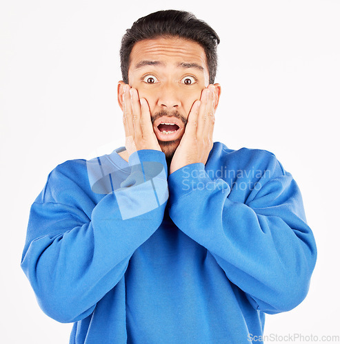 Image of Scared, wow and portrait of asian man with surprise in studio for gossip, fear or crazy drama on white background. Omg, wtf and face of male model with expression for terror, horror emoji or bad news