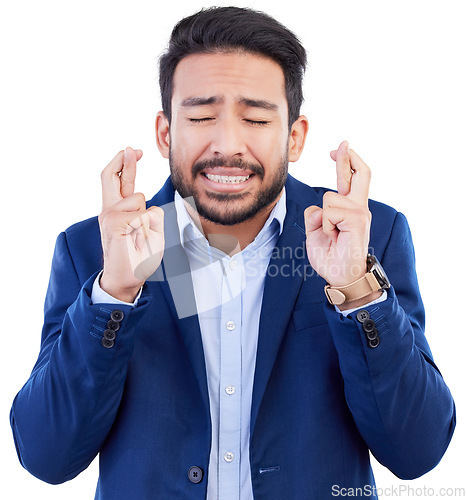 Image of Hope, business man and fingers crossed while waiting for announcement, bonus feedback or sign on white background. Face of nervous asian worker wish of belief, emoji or anxiety of promotion in studio