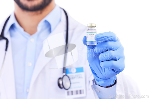Image of Monkeypox vaccine, medicine bottle and doctor hands with vial for healthcare, safety and immunity in studio. Closeup, medical worker and vaccination for virus, development or risk on white background