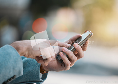 Image of Hands, typing or person with a phone in city for social media data, location or notification. Closeup, website or entrepreneur with a mobile app for online direction, news or email in morning travel