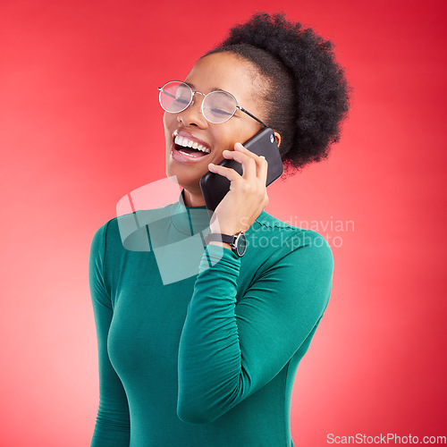 Image of Happy woman, phone call and laughing for funny joke, meme or conversation against a red studio background. Female person smile and laugh for fun discussion or social media on mobile smartphone