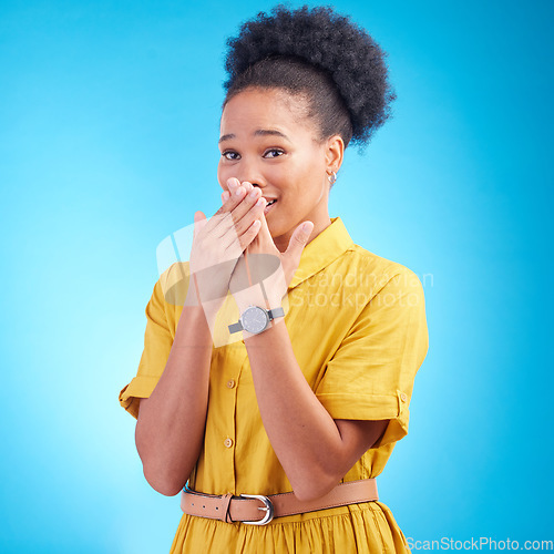 Image of Surprise, omg and hand on face of black woman in studio embarrassed by gossip, rumor or fake news on blue background. Wtf, shock and African lady with emoji reaction to secret, drama or announcement