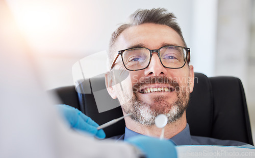 Image of Senior man, smile and teeth, dentist and metal tools with health consultation, dental and oral care at clinic. Orthodontist, healthcare and medical check, gingivitis and cleaning mouth with wellness