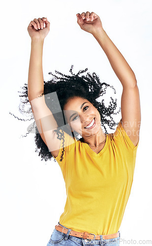 Image of Portrait, dancing and a woman in studio with fun energy, motivation or celebration. Hands, happy and a young female person isolated on a white background moving to relax or cheer for win or freedom