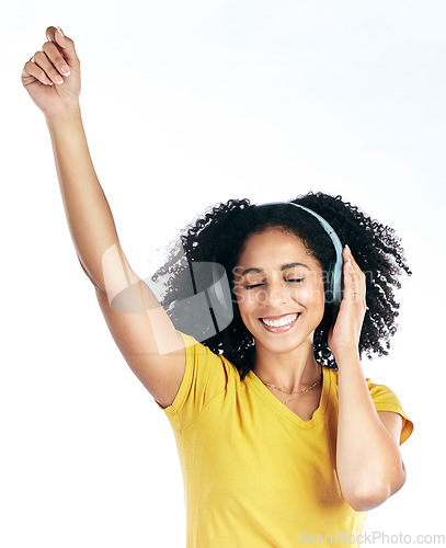 Image of Dance, music and a woman with headphones in studio streaming audio, sound or radio. Energy, happy and a young african person isolated on a white background listening and moving to fun song to relax