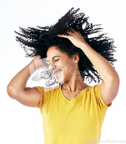 Image of Hair, dancing and crazy woman with afro hairstyle, smile and fashion isolated in a studio white background. Energy, casual and young person with stylish or trendy clothes happy, celebrate and freedom