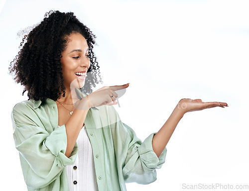 Image of Pointing, announcement or happy woman with sale, retail offer or discount deal isolated in studio. Hand, advertising or excited girl showing mockup space, news or menu promotion on white background