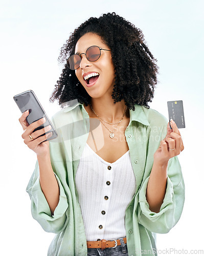 Image of Studio, phone or happy woman with credit card for an investment on financial digital fintech. Mobile app, ecommerce payment or excited female person typing banking info for online shopping promo