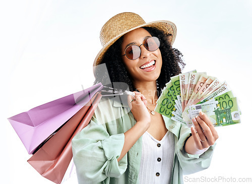 Image of Happy woman, shopping and money in studio for cashback, award or giveaway on white background. Cash, winner and female customer with sale, payment or retail, competition or prize of financial freedom