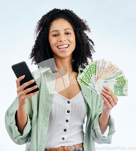 Image of Woman, phone and cash in studio portrait with smile for prize, investment or excited by white background. Isolated African girl, smartphone and winner with money fan, success or profit on fintech app