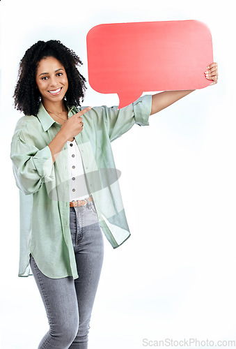 Image of Woman portrait, smile and hand pointing to speech bubble in studio for social media, contact or info on white background. Happy, face and lady show poster for voice, feedback or FAQ, forum or quote