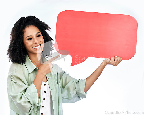 Image of Woman, studio portrait and point at speech bubble with smile for promo, mockup or space by white background. Isolated African girl, happy student and sign for poster, paper billboard or social media