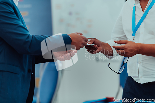 Image of Business Discussion Talking Deal Concept. Businessmen Exchange Business Cards