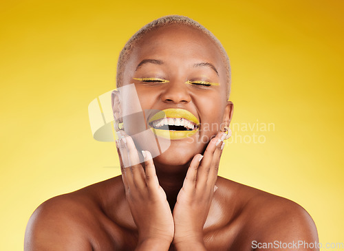 Image of Happy, gold makeup and a black woman on a studio background for creativity, skincare and beauty. Laughing, wellness and an African model or girl with lipstick isolated on a backdrop for an aesthetic