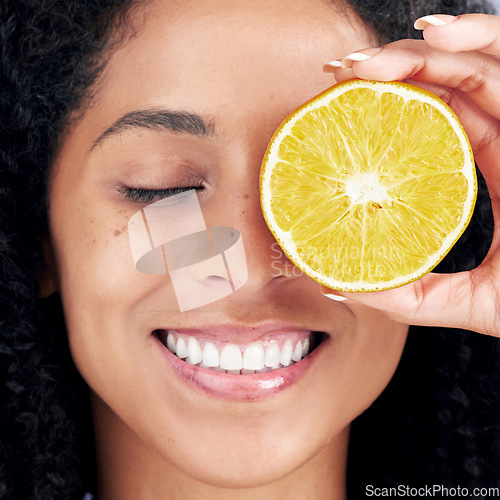 Image of Wellness, face and woman with skincare for lemon eye with nutrition for healthy glow. Closeup, girl and vitamin c or facial treatment with fruit for dermatology routine and organic food for diet.