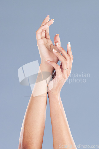 Image of Hands, nails and manicure with woman and beauty, skincare and dermatology isolated on grey background. Natural cosmetics, wellness and self care, female model and bodycare with skin glow in studio