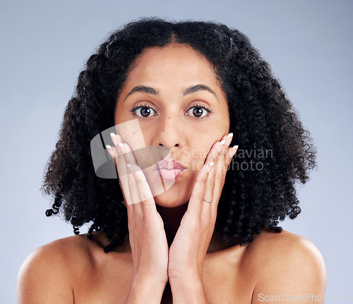 Image of Woman, skincare and touching face for beauty in studio isolated on a white background. Natural cosmetic, portrait and African model with spa facial treatment for aesthetic, wellness or dermatology