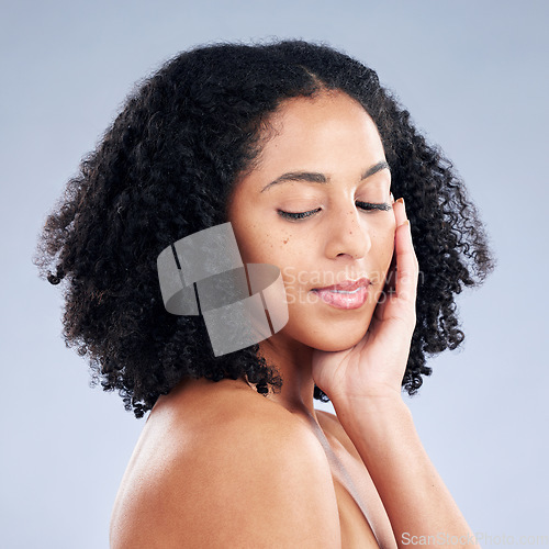 Image of Face, skincare and woman touching for beauty in studio isolated on a white background. Natural, cosmetic and African model with spa facial treatment for dermatology aesthetic, wellness or skin health