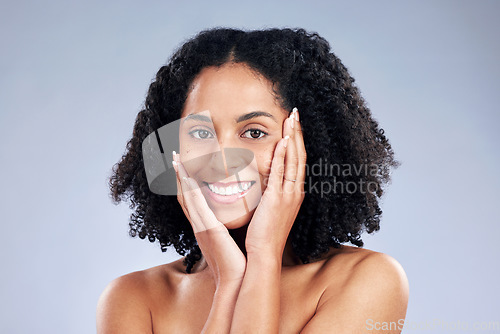 Image of Skin, beauty and a woman with hands on face for dermatology, cosmetics and natural makeup. Portrait of a happy african female model on a studio background for facial self care, glow and soft touch