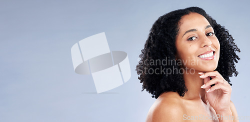 Image of Skin, beauty and portrait of a woman in studio for dermatology, cosmetics and natural makeup. Face of happy african female model on a mockup space background for facial self care, glow and soft touch