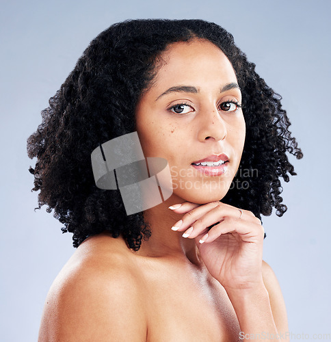 Image of Portrait, beauty and facial with a model black woman in studio on a gray background for skincare. Face, aesthetic or confident with a young female person at the salon for luxury wellness or treatment