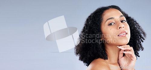 Image of Portrait, beauty and space with a model black woman in studio on a gray background for skincare. Face, aesthetic and mockup with a young female person at the salon for luxury wellness or treatment