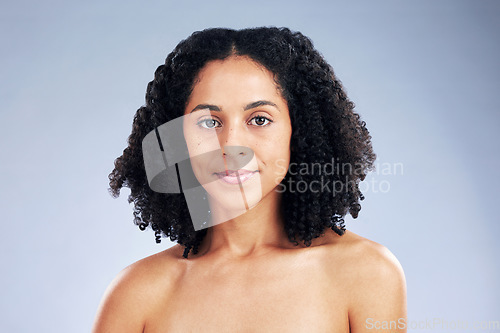 Image of Portrait, beauty and confident with African model woman in studio on a gray background for skincare. Face, aesthetic and natural with a young female person at the salon for serious skin wellness