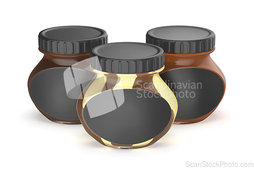 Image of Glass jars with different chocolate creams