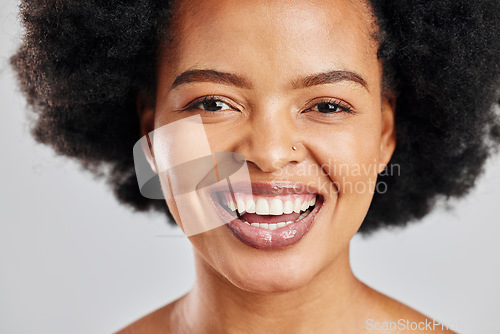 Image of Beauty, portrait and African woman laughing with skincare shine, studio cosmetics and natural aesthetic makeup. Comedy joke, humour and afro face of happy person with self care on white background