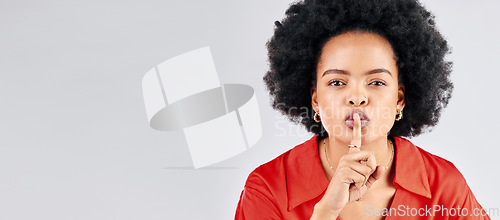 Image of Secret, portrait and black woman with finger on lips in studio for sign of privacy, mockup space and white background. Banner, face and female model shush for noise, mystery news and silence emoji