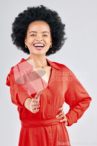 Image of Black woman, portrait and handshake in studio for agreement, partnership deal and onboarding. Happy model, shaking hands and offer greeting for networking, welcome and thank you on white background