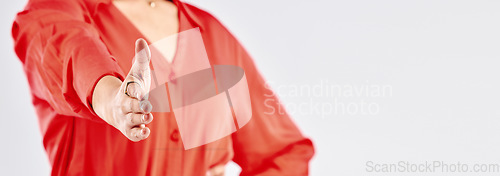 Image of Woman, closeup and handshake in studio for meeting, partnership deal and onboarding on mockup space. Banner, model and shaking hands for offer, interview or welcome to recruitment on white background