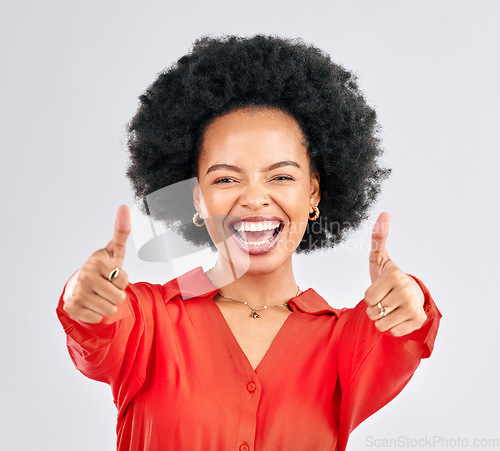 Image of Thumbs up, happy and portrait of a businesswoman in studio with success, achievement or goal. Happiness, smile and professional African female person with an agreement hand gesture by gray background