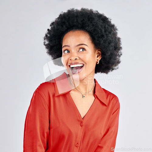 Image of Thinking, happy and a black woman hearing gossip or good news in studio on a white background. Idea, smile and a curious young female person with an afro eavesdropping or listening to a secret