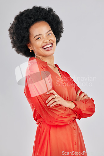 Image of Portrait, smile and black woman with arms crossed, business and fashion designer against a white studio background. Female person, entrepreneur or model with leadership skills, career or professional