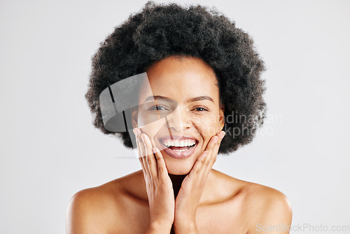 Image of Beauty, hands on face and portrait of a black woman with dermatology, cosmetics or natural makeup. Headshot of happy African female model in studio for facial glow, afro and soft touch with self love