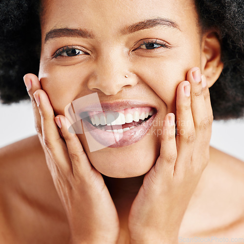 Image of Beauty, skin care and portrait of happy woman with dermatology, cosmetics or natural makeup. Closeup on face of African female model in studio for facial glow, self love and soft touch or teeth smile