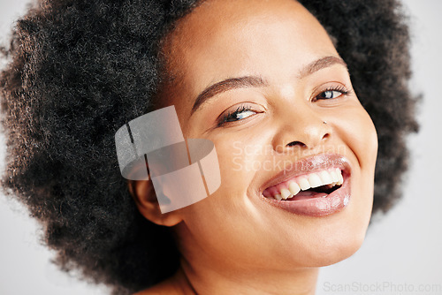 Image of Beauty, happy and portrait of a black woman with skin care, cosmetics or natural makeup. Closeup and face of an African female model in studio for facial glow, dermatology or afro hair and self love